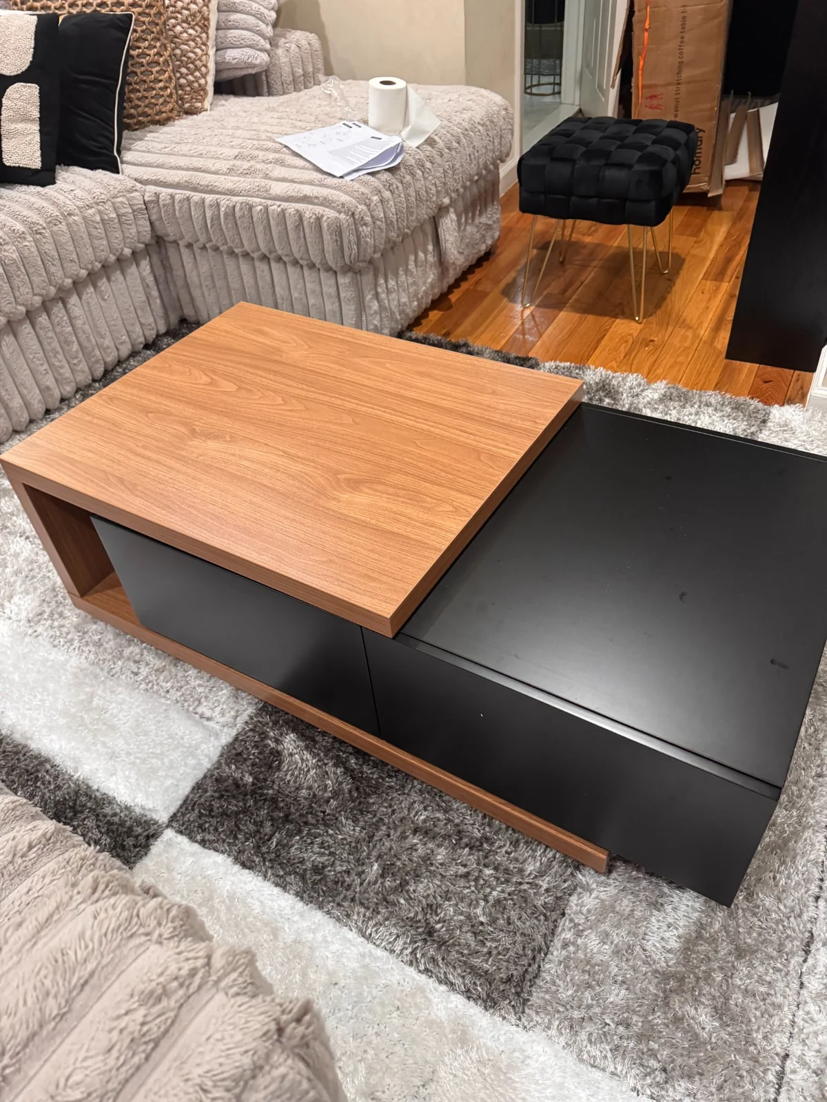 Modern black and wood coffee table assembled by Assemble Pro NJ
