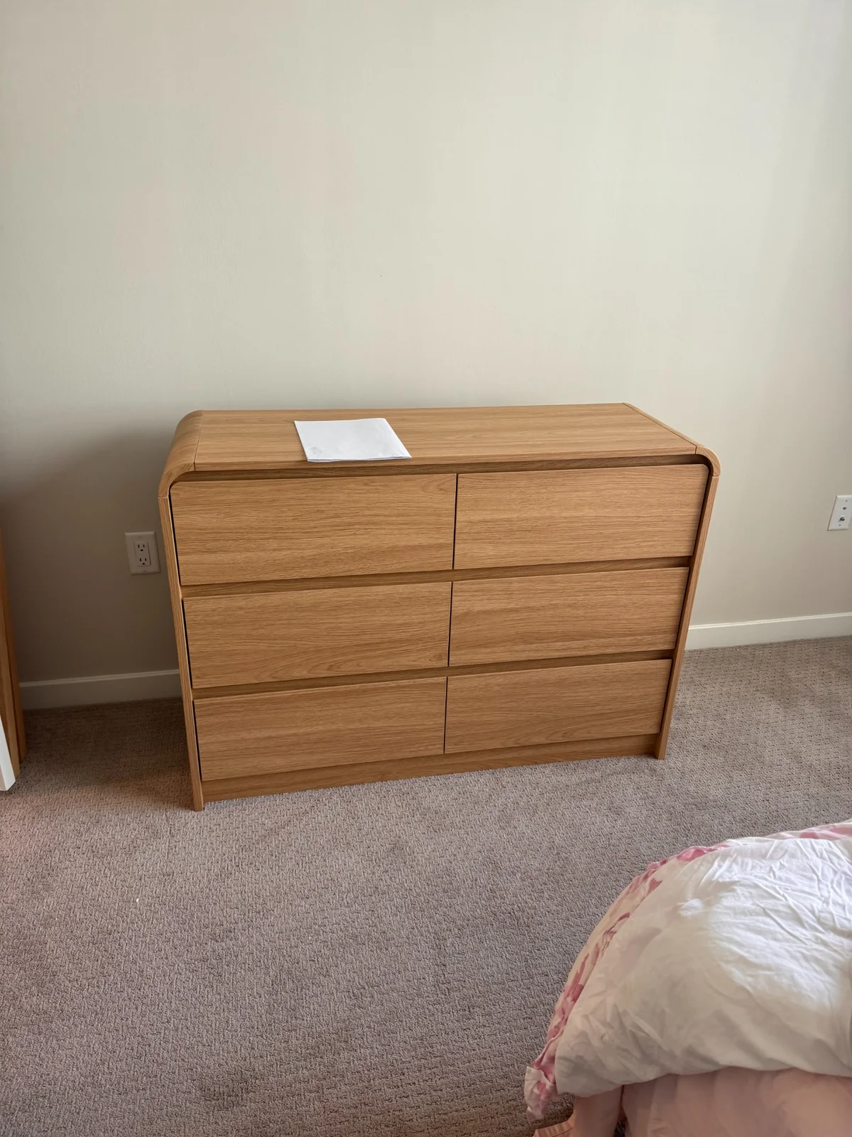Light wood six drawer dresser assembled by Assemble Pro NJ
