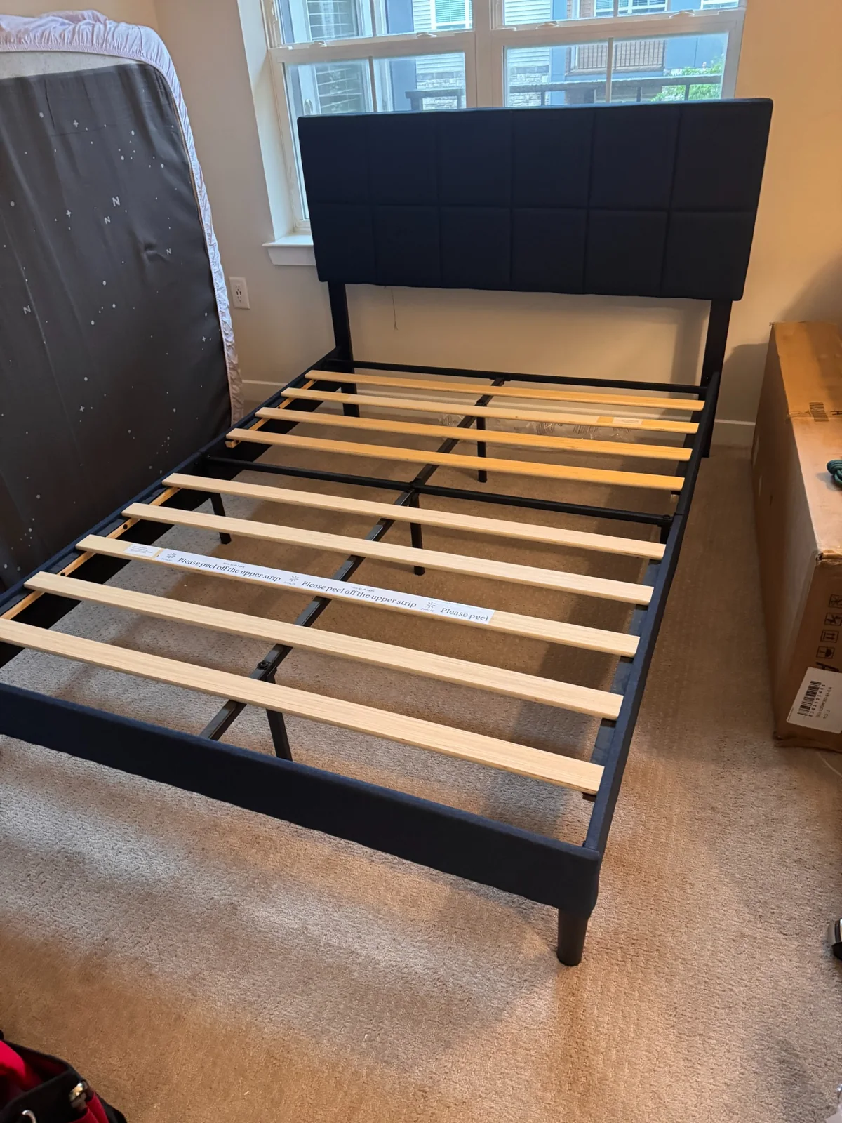 Upholstered platform bed frame assembled by Assemble Pro NJ