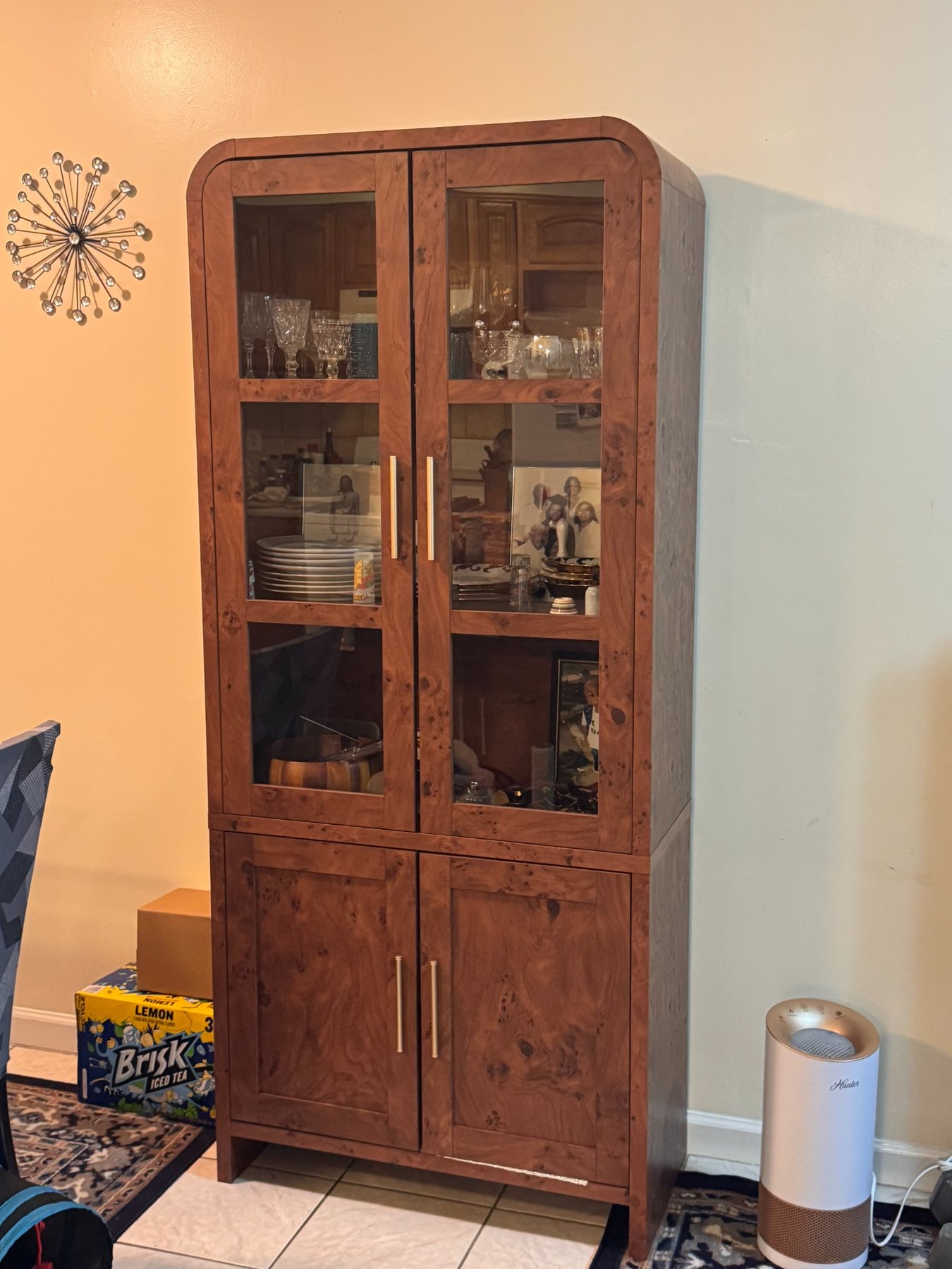 Tall glass display cabinet assembled by Assemble Pro NJ
