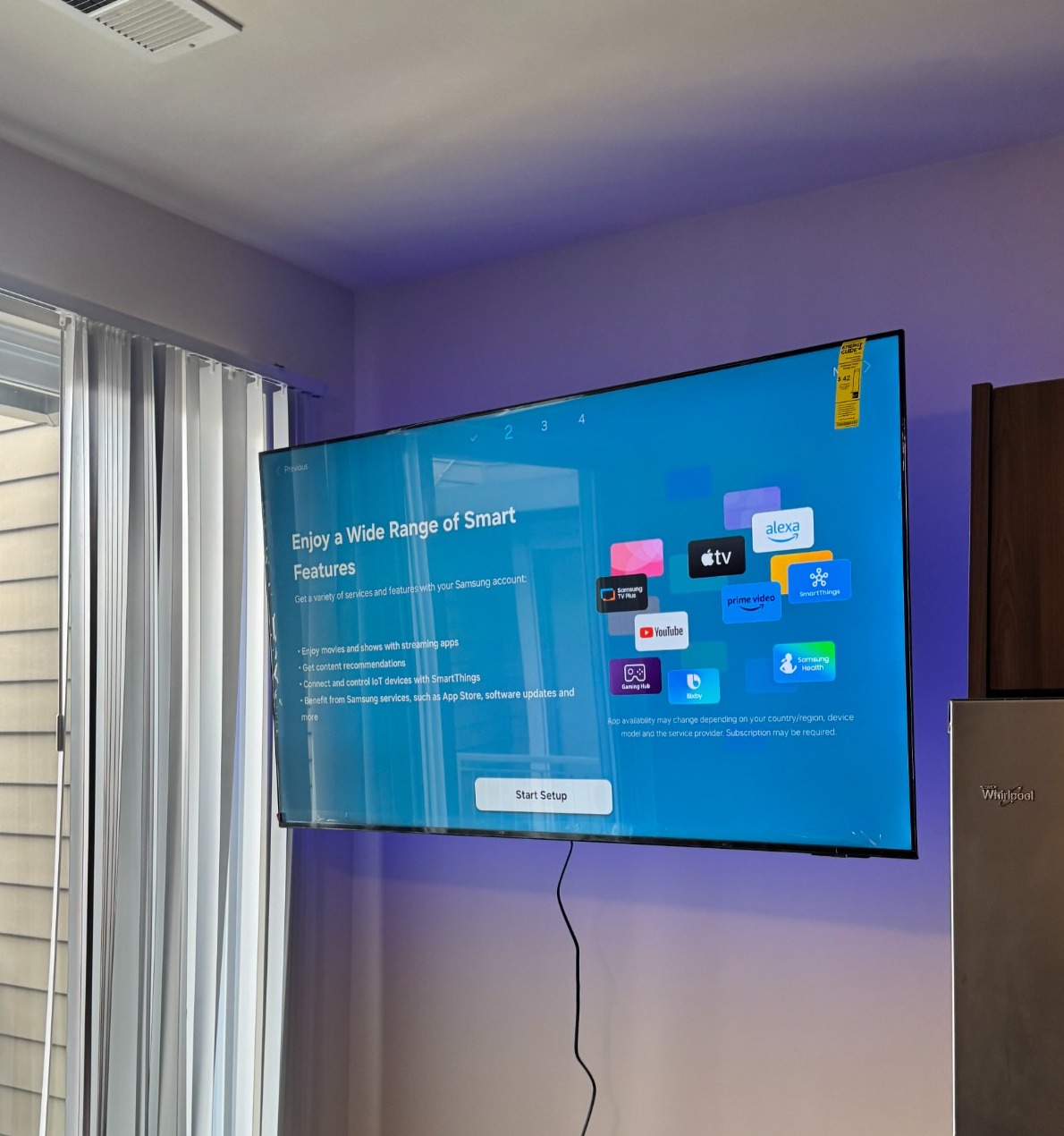Mounted TV installed by Assemble Pro NJ in a bright North Jersey apartment